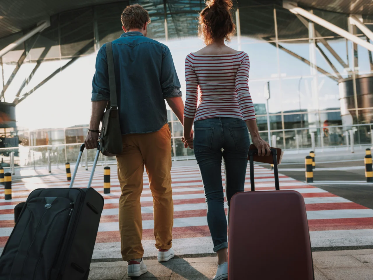 A couple travelling after completing their document formalities